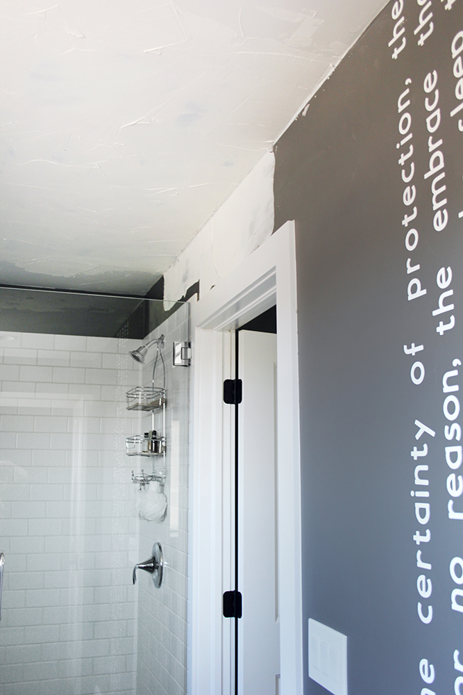 Newly patched bathroom ceiling and wall. 