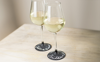 Wine glasses painted with chalkboard paint