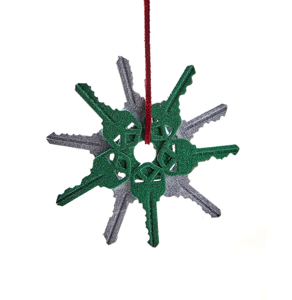 Snowflake ornament made from keys painted green and silver. 