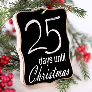 A chalkboard ornament that says 25 days until Christmas.