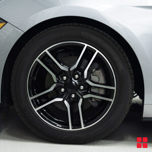 Car tire before it is shined with Wipe New.