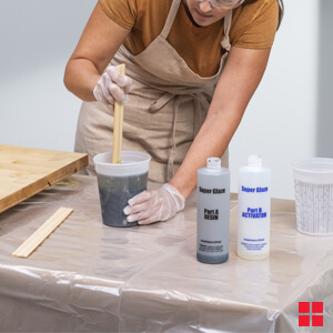 Mixing The Base And Activator Together With A Stir Stick