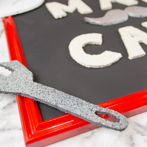 Close view of a completed man cave sign.