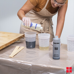 Pouring Varathane Tinted Super Glaze Activator Into Clean Cup